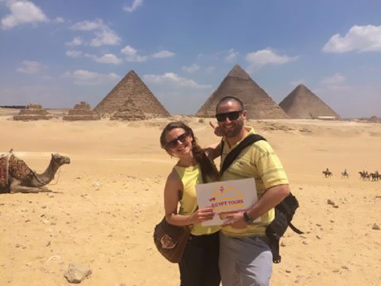 Pyramids Happy clients camel ride